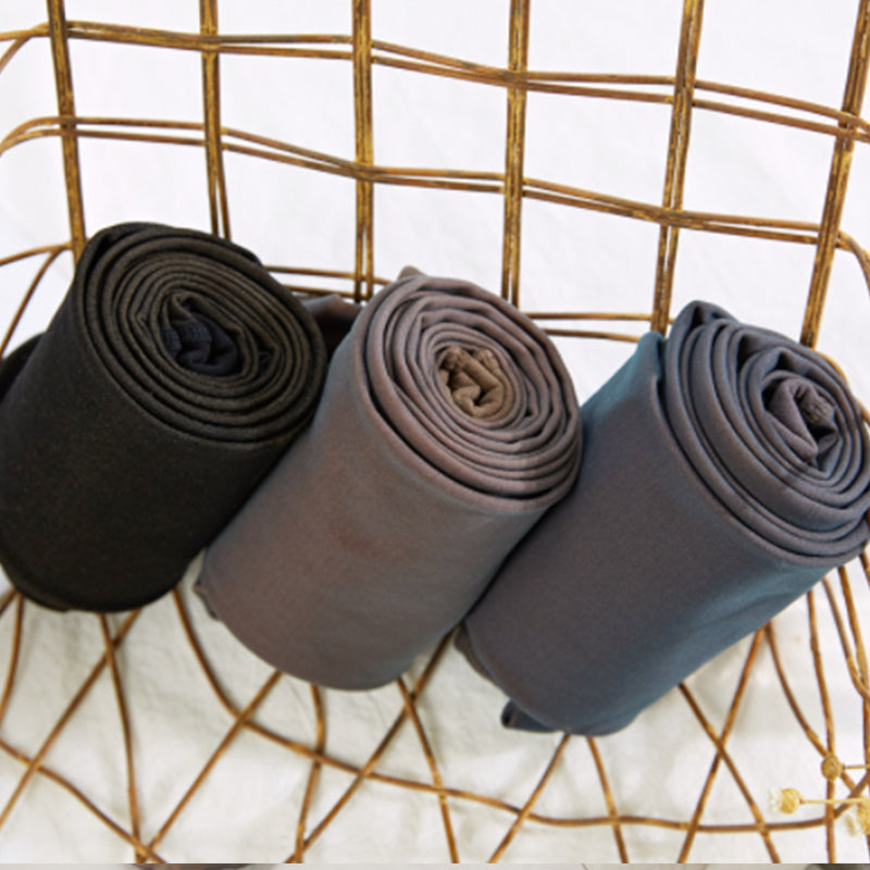 Collants effet peau en trois coloris : noir, gris et café